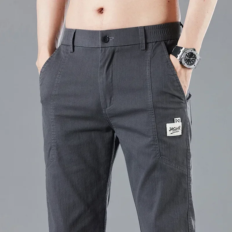 Весенне-летние мужские тонкие повседневные брюки с эластичной резинкой на талии, Корейские модные хлопковые стрейчевые деловые брюки, мужские серо-синие Изображение 0